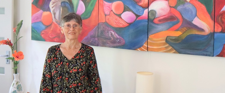 Frances leads fellow residents in art class. Frances leads fellow residents in art class.