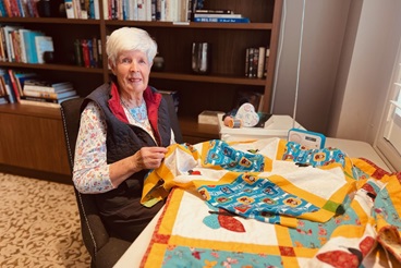 Wendy with her quilting project__.jpg